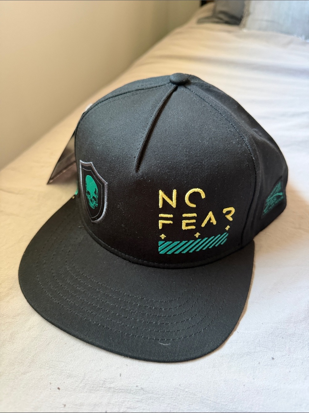 Grunt Style Black Snapback Hat with Yellow & Teal Graphics